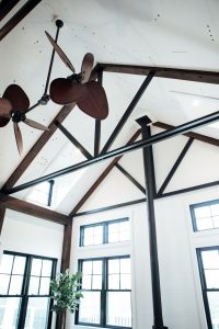 image of Vaulted ceiling with beams and cool ceiling fans